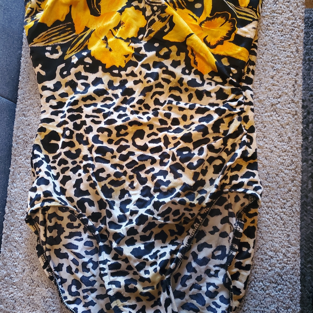Charles Albert Tan and Black Swimsuit